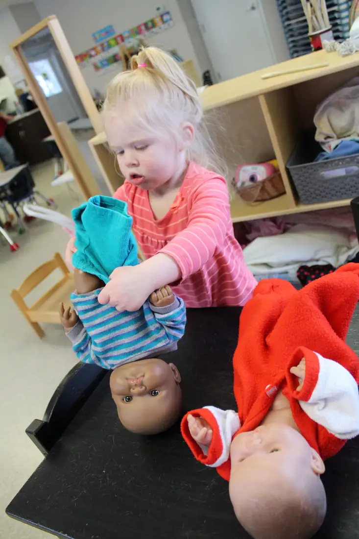 child playing at table